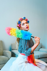 housewife posing with duster