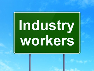 Industry concept: Industry Workers on road sign background
