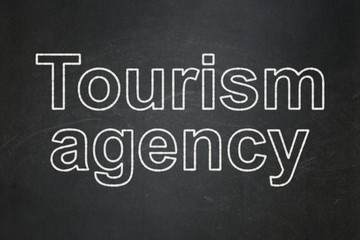 Obraz premium Vacation concept: Tourism Agency on chalkboard background