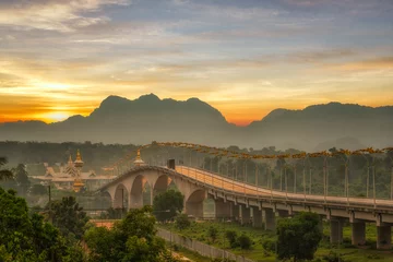 Fotobehang Morning light of 3rd thai-lao friendship bridge at nakhon phanom ,thailand © Atakorn