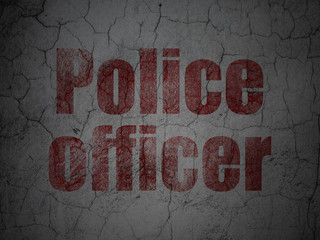 Fototapeta premium Law concept: Police Officer on grunge wall background