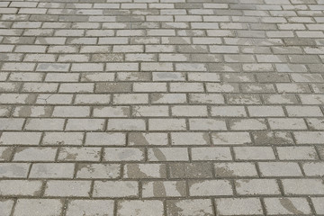 Old grey stone pavementl background texture