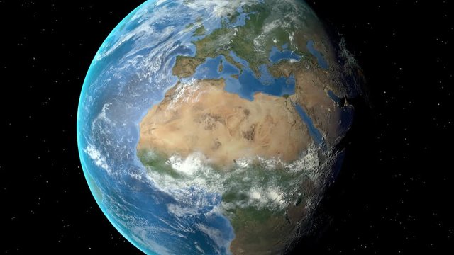 Night to day - rotating Earth. Zoom in on Morocco outlined