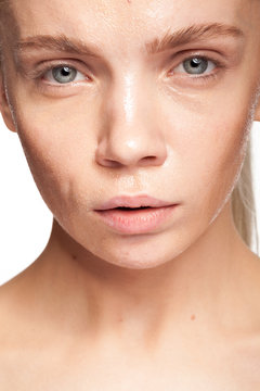 Woman with wet face. Studio photo. Beauty and skin care
