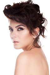 Beautiful gorgeous brunette model in studio photo isolated over white background. Perfect make up and hairstyle