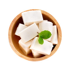 Tofu in wood bowl  isolated on white background
