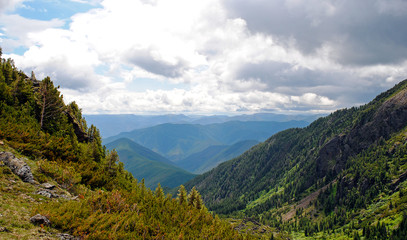 Obraz premium Summer mountain landscape. View of the hills and meadows on Lake Baikal, Russia