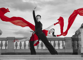 Pair of dancers dancing ballroom