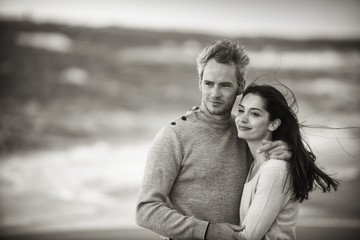 Portrait of a couple walking on the beach