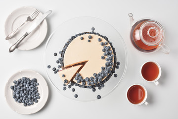 sliced cheesecake with blueberries