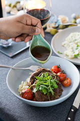 Steak with red wine jus and mashed potatoes