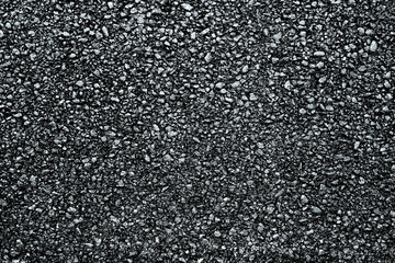 Dark asphalt roadbed.