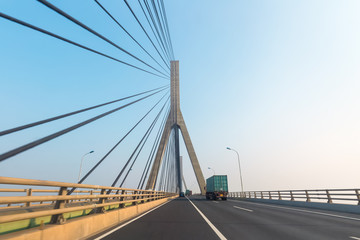 Fototapeta na wymiar container trucks on bridge