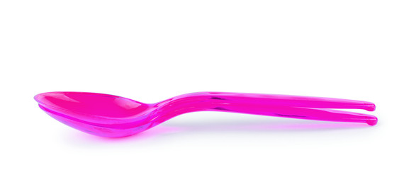 Pink plastic spoon isolated on white background