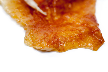 Roast chicken leg isolated on white background.