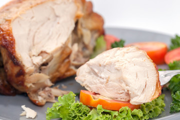 close up of roast chicken on plate