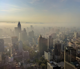 Fototapeta na wymiar Nanjing city with sunrise and morning mist from high angle.