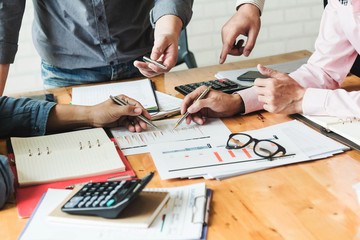 Business meeting Businessmen analyze financial figures and plans.