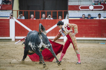 Bullfighter in a bullring.