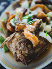 thai food , Deep-fried sea bass with onion, onion, fish sauce