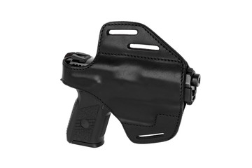 pistol in a black leather holster isolated on white