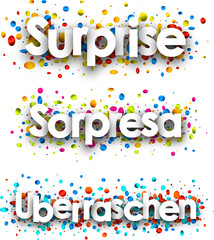 Surprise banner with colorful confetti.