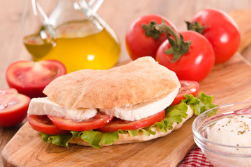 Puccia bread with mozzarella and tomato. 