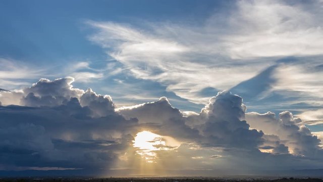 Time Lapse of Colorful dramatic sky with cloud at sunset.Sky with sun background