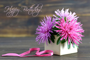Happy Birthday card with flowers arranged in gift box