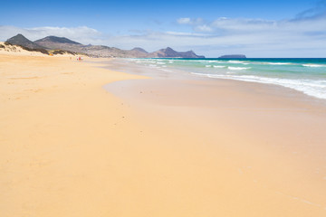 Fototapeta na wymiar Sandy wide beach of the island of Porto Santo