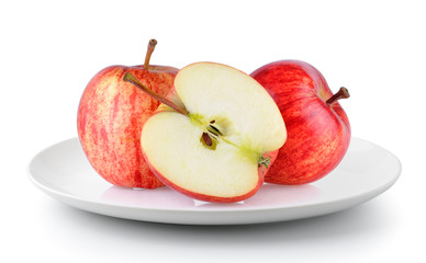 red apple in a plate isolated on a white background