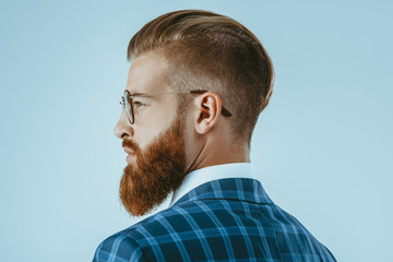 Fototapeta premium man in eyeglasses with stylish hairstyle