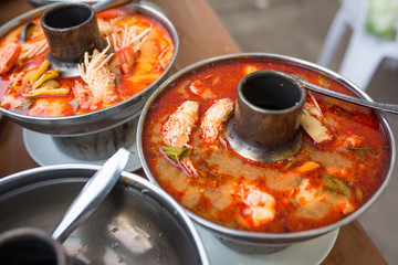 Tom yum goong or tom yam is a type of hot and sour Thai soup.