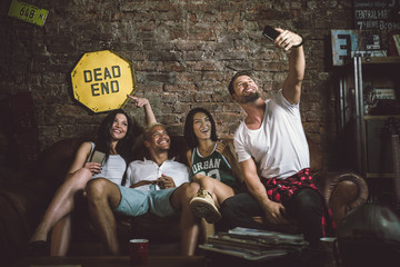 Group of friends partying at home