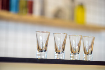 empty glasses on bar counter