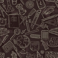 Seamless pattern with school icons.Stationery on a blackboard.Design for lessons, teacher's day, knowledge day.Vector illustration with sketch globe, alarm clock, book, pen, ruler and other stationery