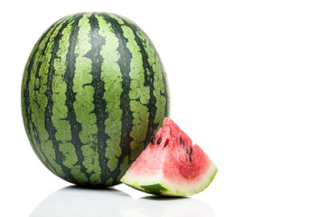 watermelon with slices standing isolated on white background