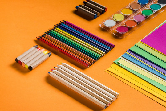 Colorful pencils and papers