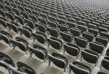Naklejka premium reclining chairs on the stadium bleachers with no people before