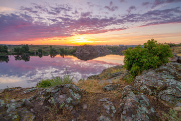 Sunset over the Dnieper river, view from the rocky cliff of Khortytsia island, Zaporozhye, Ukraine