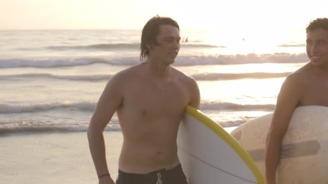 Carrying surfboard