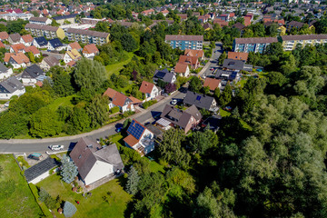 German suburb with forest, aerial photo