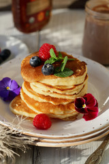Golden pancakes with summer berry