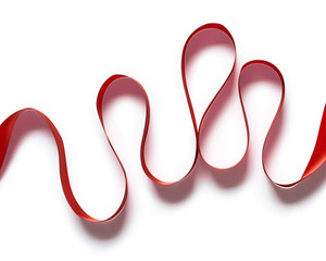 Red ribbon abstraction isolated on white background