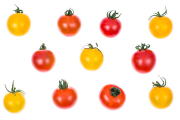 Small colored cherry tomatoes on white background
