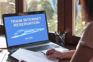 Train internet reservation concept on a laptop screen - obrazy, fototapety, plakaty