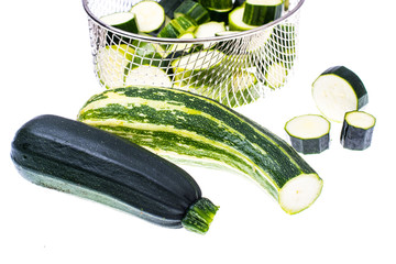 Young zucchini, cut into slices - obrazy, fototapety, plakaty