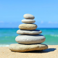 Fototapeta na wymiar Zen inspiration, stones pyramid in balance