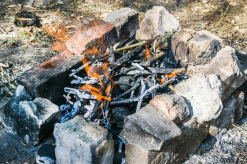 On a hot summer day, a fire burns out.