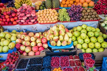 Fruit market with various colorful fresh fruits. Fresh fruits.  Fruits  at a farmers market